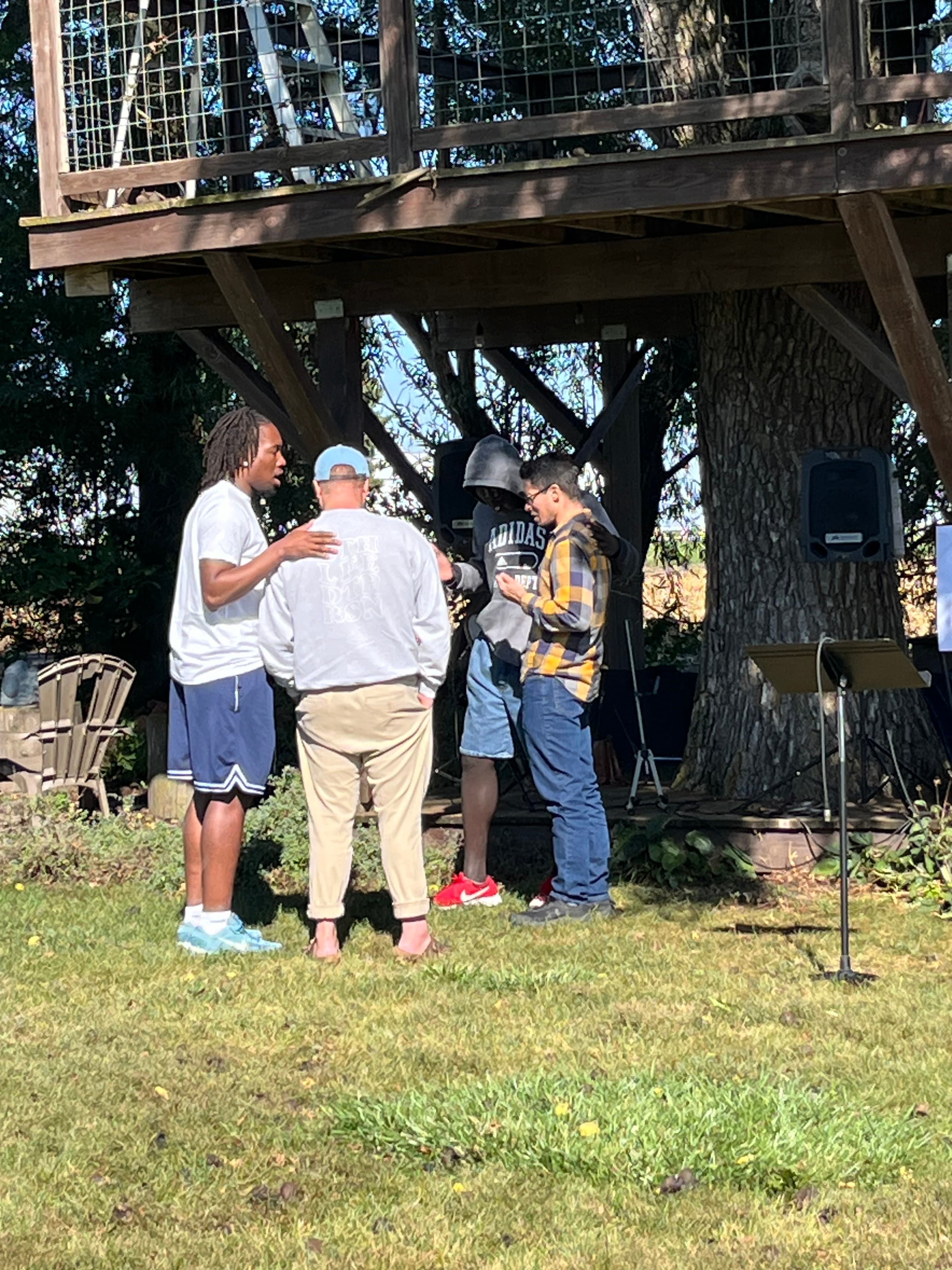 A pastor in prayer at a Church For Pastors gathering.